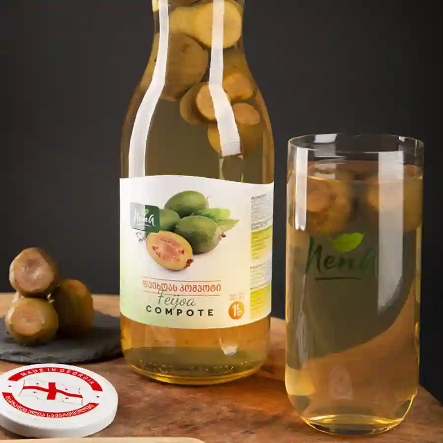 Nena Compote Feijoa - 1 L Feijoa is a fruit you won't find in Czech supermarkets — but once you taste it, you'll understand why Georgians love it. A compote with delicate aromas of pineapple, wild strawberry and mint. A jar of Georgian autumn on your table. Nena Compote Feijoa - 1 L - Image 4