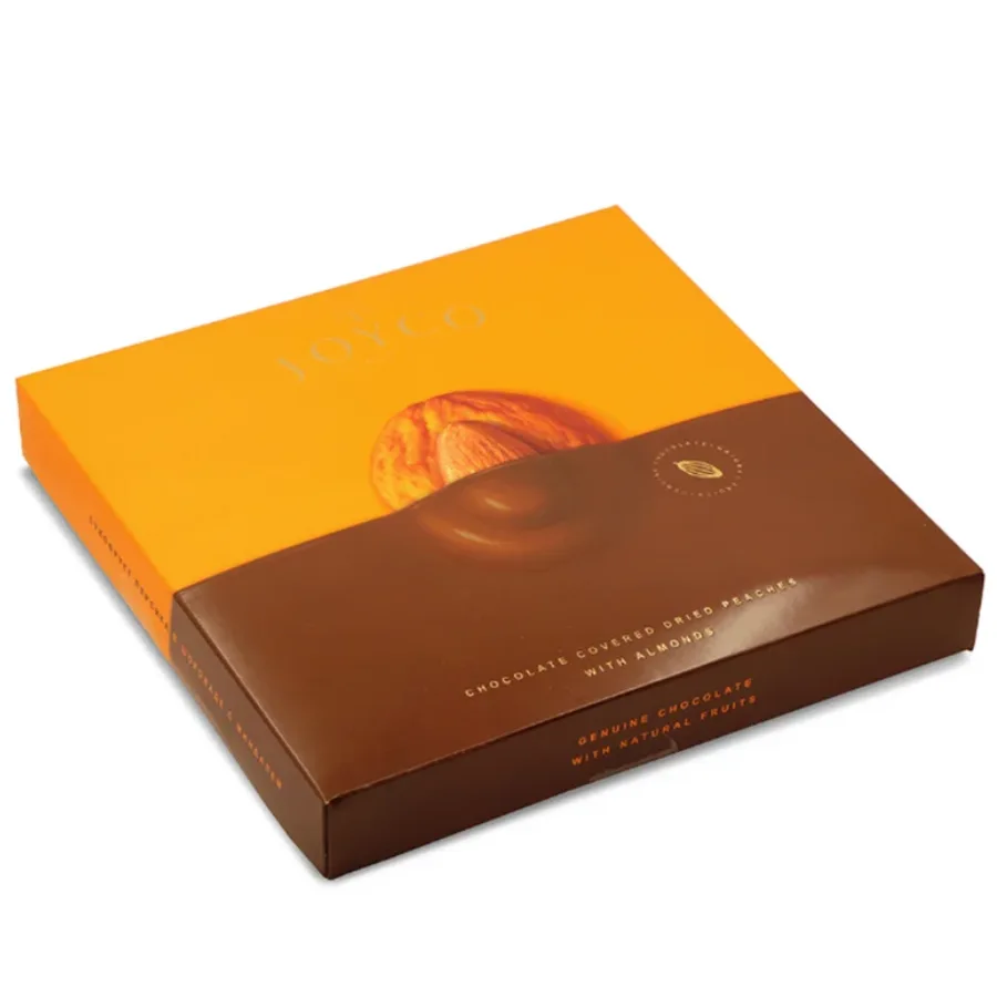 Dried Peaches in Chocolate with Almonds - 190 g. Another treat from the Armenian brand Joyco, adding to our range of Georgian and Caucasian sweets. Dried peaches coated in chocolate and topped with almonds offer the gently sweet, aromatic flavour of peach combined with chocolate smoothness and a light almond crunch. Dried Peaches in Chocolate with Almonds - 190 g.